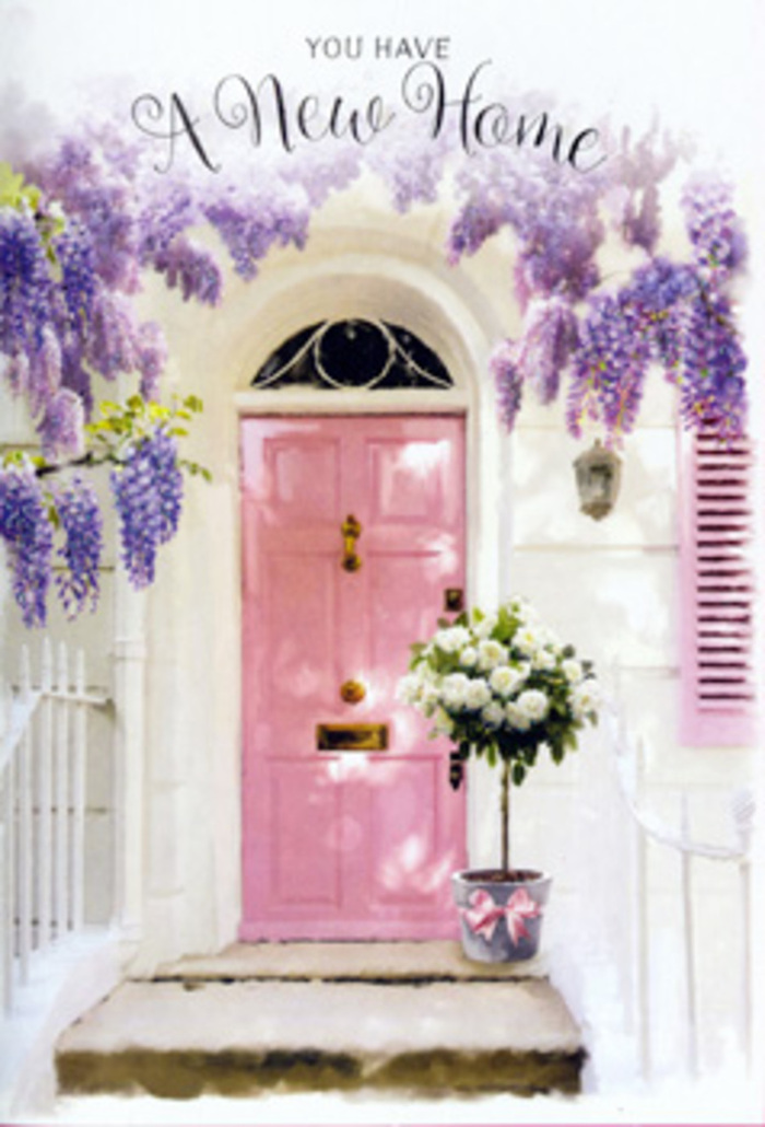 In this photograph, the spirit of a new chapter is captured at a doorway that feels as though it belongs on a peaceful residential road just off Winchmore Hill's bustling centre. A front door painted in a gentle pink hue stands firm and welcoming, its colour soft enough to feel almost powdery, like the inside of a rose petal. The panels are neat and subtly defined, catching the natural light in a way that makes the whole entrance glow. Enveloping the top of the frame and spilling down in abundant tails is a canopy of wisteria, its slender stems adorned with countless small blossoms in layers of lavender, lilac, and muted mauve. The flowers form loose, trailing clusters that hang in front of a whitewashed wall and a complementary pastel shutter, together creating a serene backdrop that allows the floral textures to shine. Nestled at the base of the door, a weathered-style grey metal bucket holds a lush arrangement of white and creamy roses. The roses are densely packed, some blossoms fully open with ruffled centres, others just beginning to unfurl, giving the bouquet a sense of natural movement and time passing gently. Threads of soft green foliage slip between the blooms, cooling the palette and evoking the leafy calm of nearby Grovelands Park. Tied around the bucket is a satin ribbon in delicate blush pink, fashioned into a tidy bow whose ends fall gracefully along the curve of the metal. Soft, dappled light filters through the overhead wisteria, scattering subtle highlights and shadows across the step and florals. The composition feels peaceful yet full of anticipation, as if the flowers are quietly waiting to greet someone stepping through this door for the first time, keys jingling and heart full of expectation. It's an image of welcome, comfort, and gentle celebration that echoes the neighbourly warmth so typical of Winchmore Hill.